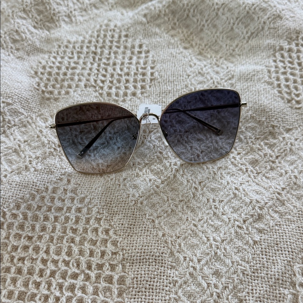 Longchamp Gold Frame Sunglasses with Gradient Gray-Black Lenses
